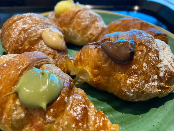 istock Italian Food: Cornetti with pistacchio, vanilia and chocolate cream 1772497262