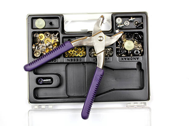 Pair of pliers and a toolbox stock photo