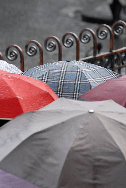 istock Umbrellas in the rain 177250233
