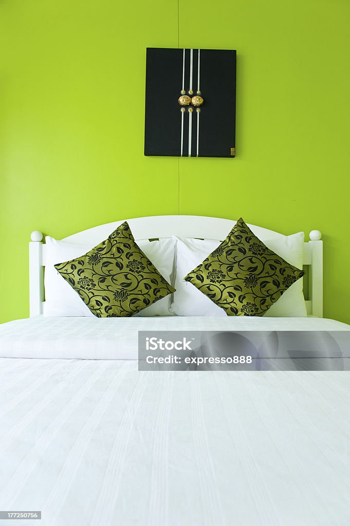 Green Bedroom in a modern house - home interiors. Apartment Stock Photo