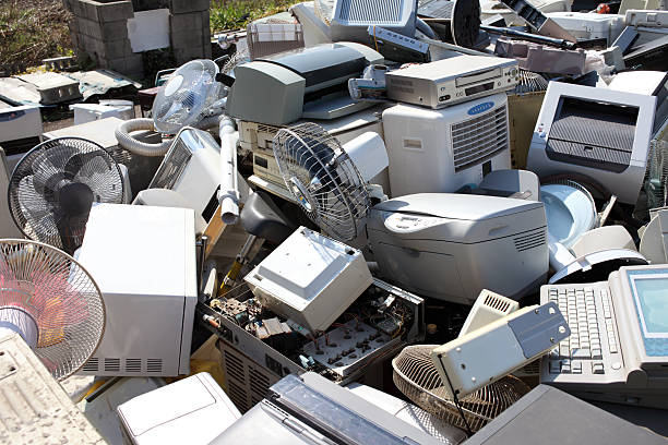 Electronic waste Electronic waste garbage dump stock pictures, royalty-free photos & images