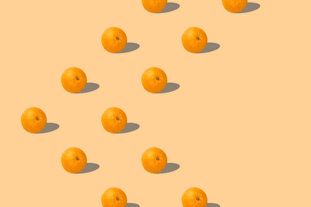 istock Fruit pattern of fresh oranges 3d render on yellow background. Pop art design, creative summer concept. Set. Seamless texture pattern. 3D illustration with copy space. 1772514717