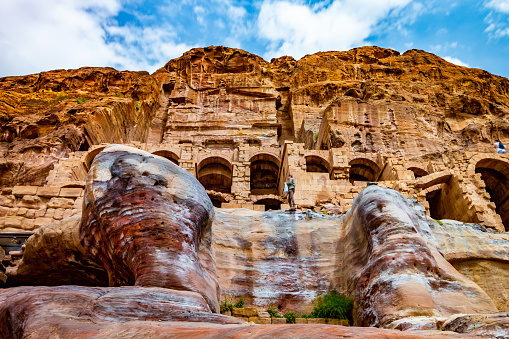 Petra, Jordan - March 29, 2019: Panorama Caves, carved in rocks in lost city of Petra, Jordan