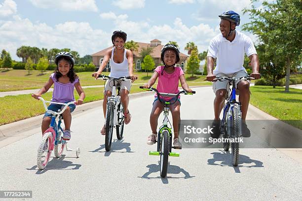 African American Family Parents And Children Cycling Stock Photo - Download Image Now