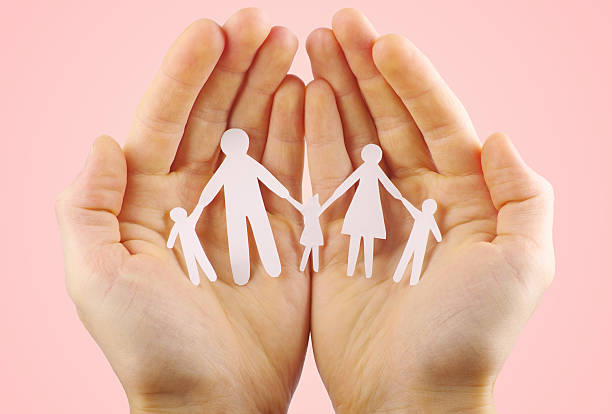 Paper family in hands