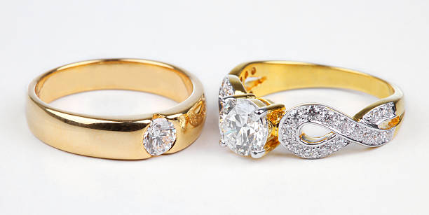 istock Two style of golden rings with diamond isolated on white. 177252907