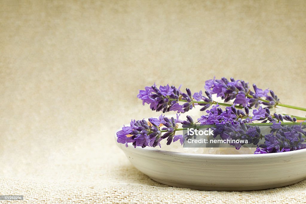 Spa bath salt and lavender - herbal treatment Background with spa bath salt and lavender flowers Alternative Therapy Stock Photo