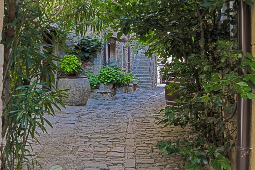Narrow alley in a medieval village in Grosseto Province