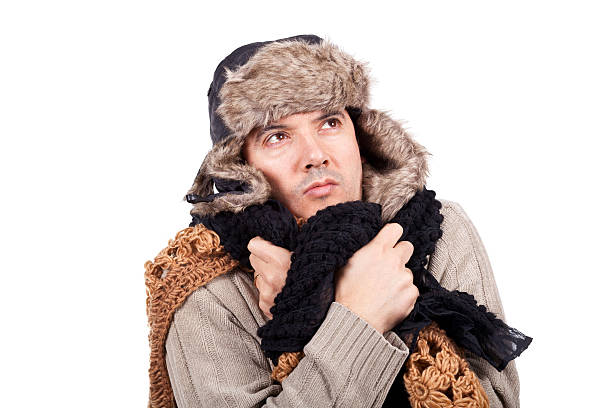 istock man with cold wearing a scarf and bonnet 177256138