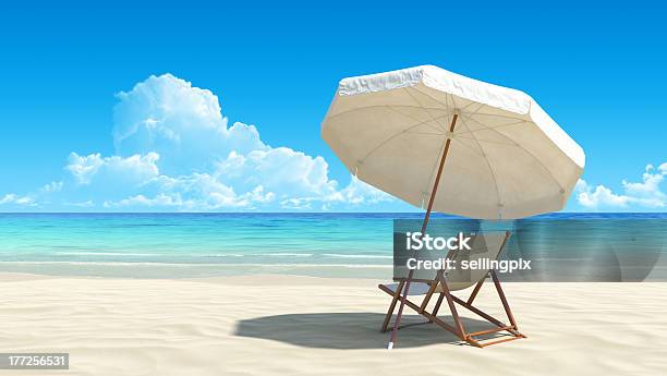 Sunlounger And Umbrella On Deserted Tropical Beach Stock Photo - Download Image Now - Beach, Umbrella, Chair