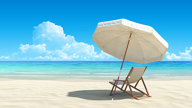 sunlounger desertas e guarda-chuva na praia tropical beach - sea summer umbrella beach - fotografias e filmes do acervo
