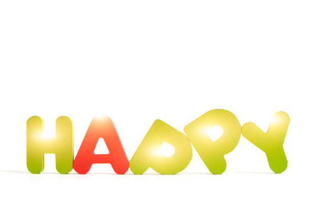 Word happy is composed multicolored letters white background with bright sunlight