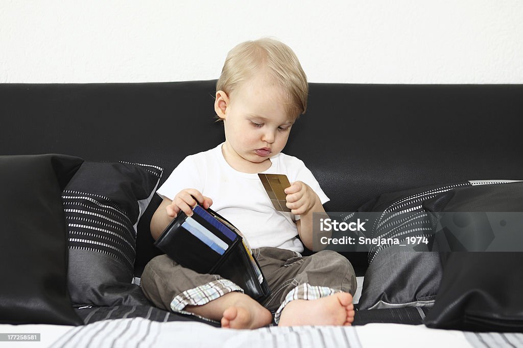 The child with a credit card Baby - Human Age Stock Photo