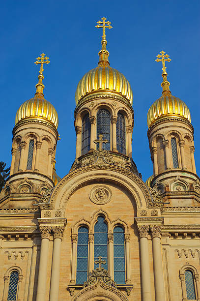 The Russian Orthodox Church in Wiesbaden/Germany The golden domes of the Russian Orthodox Church in Wiesbaden/Germany in front of a blue sky. church hessen religion wiesbaden stock pictures, royalty-free photos & images