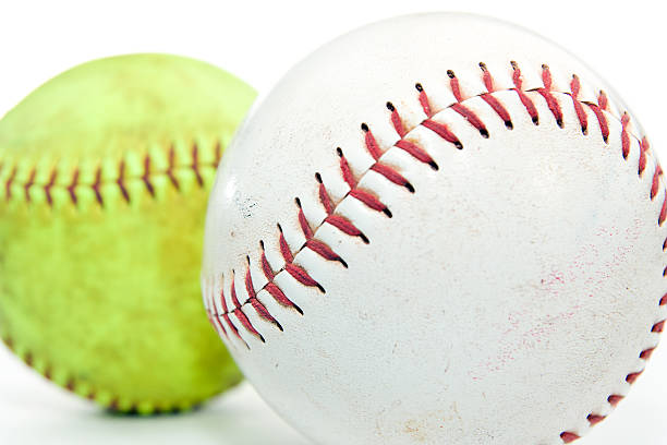 softballs sur fond blanc - baseball baseball player base sliding photos et images de collection