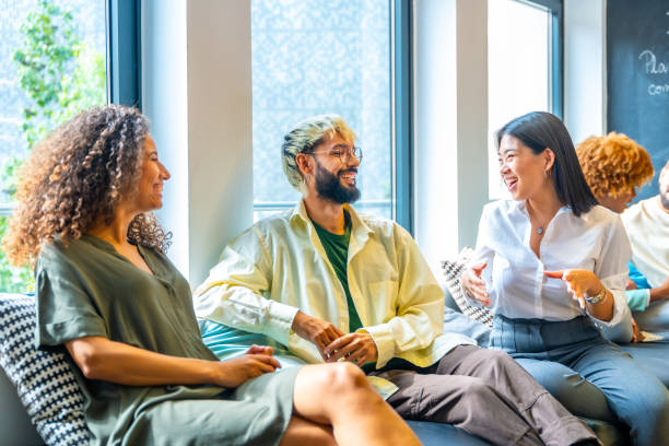 istock Multi-ethnic coworkers chilling and talking in a comfortable sofa 1772605051