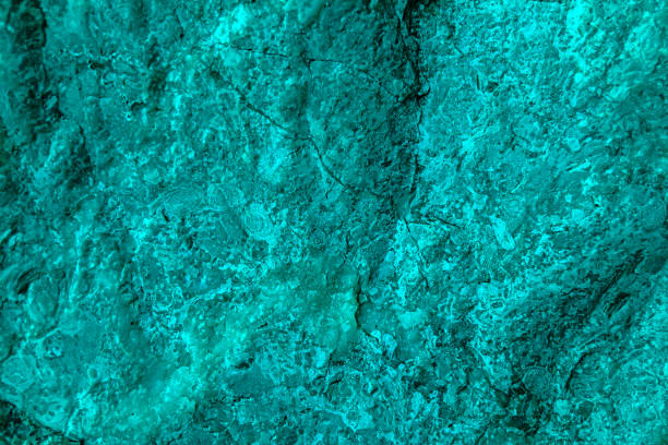 istock Blue green abstract background. Toned rough rock surface texture. Beautiful teal background. 1772605182