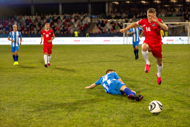istock Soccer player leading ball 1772608196