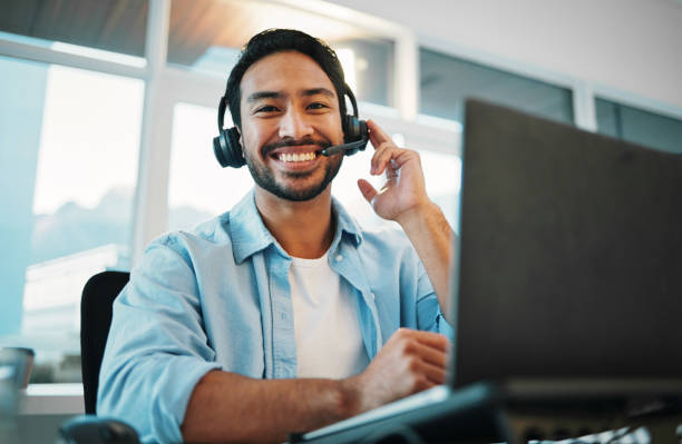 istock Call center, portrait and man, consultant or business agent speaking on computer for technical support and advice. Happy advisor talk on headphones, laptop and virtual help for information technology 1772615479