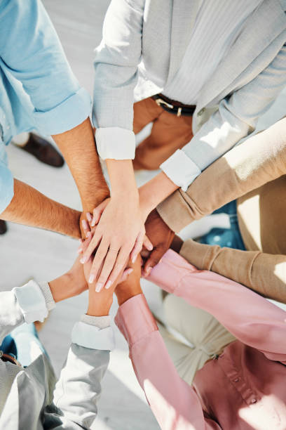 istock Teamwork, hands and support of business people in collaboration from above for integration, trust or winning. Closeup, partnership and team building for success, cooperation or achievement of synergy 1772615492