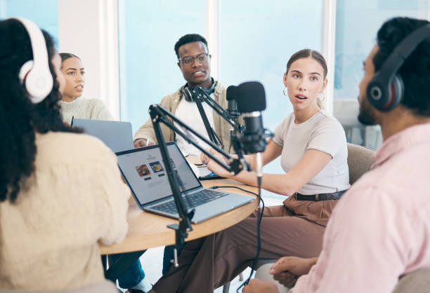 istock Conversation, podcast speaker and group of people, team or presenter communication, streaming and hosting talk show. Radio multimedia production, diversity and influencer listening on media network 1772628414