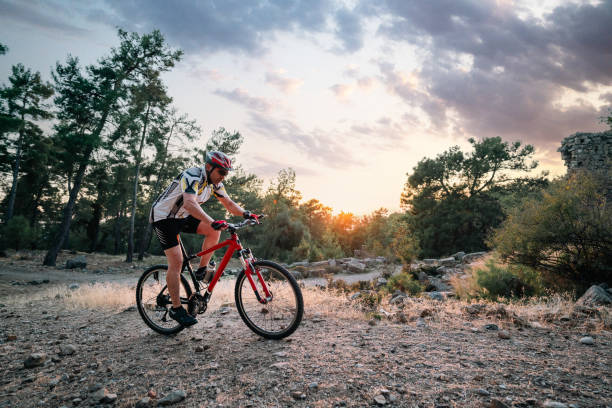 istock cyclist rides mountain bike on bumpy road 1772640676