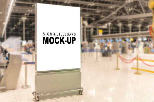 Vertical billboard stand in airport terminal Vertical billboard stand in airport terminal, it stand in high-traffic areas. Advertise product or service to a wide audience of potential customers with this eye-catching and effective display retail digital signage stock pictures, royalty-free photos & images