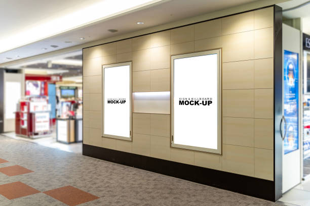 Sign and Billboard Mockup at duty free shop in departure terminal Sign and Billboard Mockup at duty free shop in departure terminal to promote your business or organization in a unique and eye-catching way. retail digital signage stock pictures, royalty-free photos & images