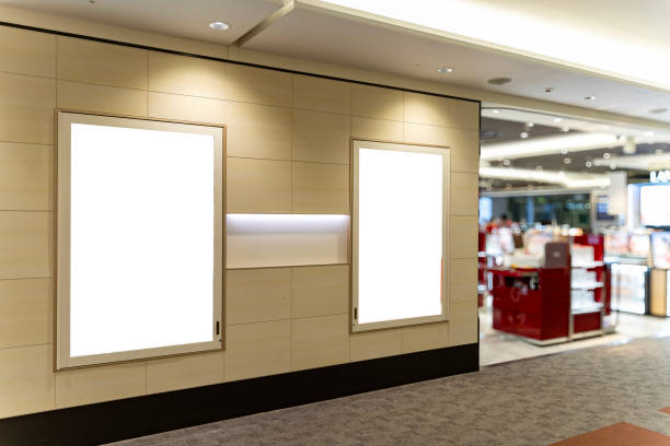 Sign and Billboard Mockup at duty free shop in departure terminal Sign and Billboard Mockup at duty free shop in departure terminal to promote your business or organization in a unique and eye-catching way. retail digital signage stock pictures, royalty-free photos & images