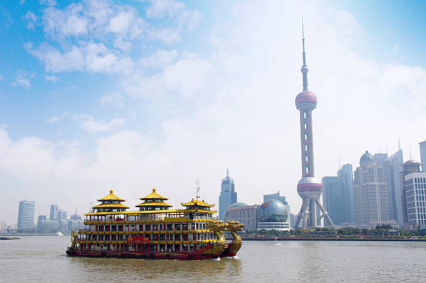 Dragon boat through the Shanghai skyline 2012