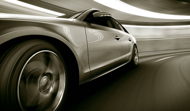 Silver car speeding in tunnel 3d rendering of a brandless generic car of my own design in a tunnel with heavy motion blur sports car stock pictures, royalty-free photos & images