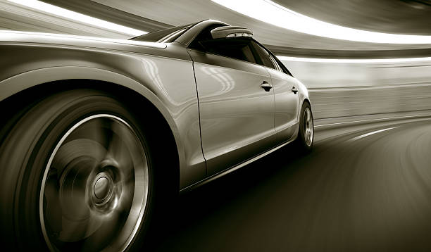 Silver car speeding in tunnel 3d rendering of a brandless generic car of my own design in a tunnel with heavy motion blur concept car stock pictures, royalty-free photos & images