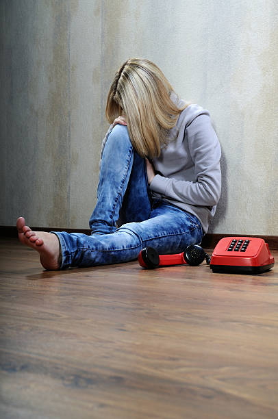istock Girl and red phone. 177264748