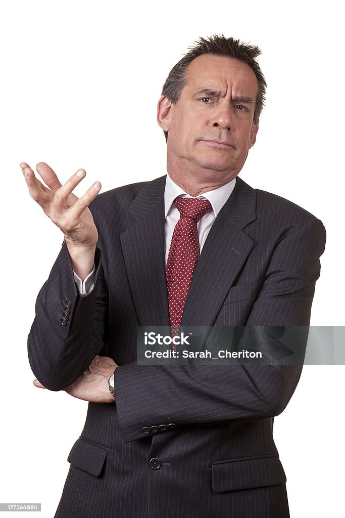 Деловой человек в костюме с раздраженная экспрессии - Стоковые фото Бизнесмен роялти-фри