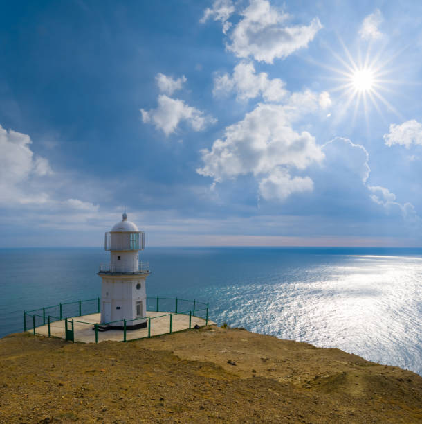 istock closeup lighthouse stay on marine cape at summer sunny day 1772650914