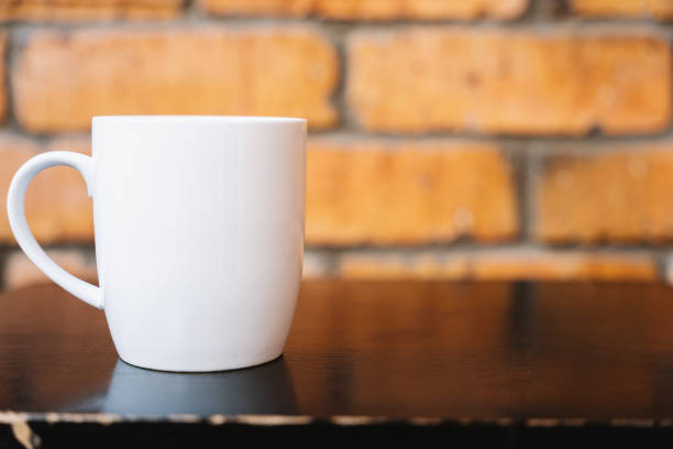 istock Coffee break with white mug on wooden table 1772665038