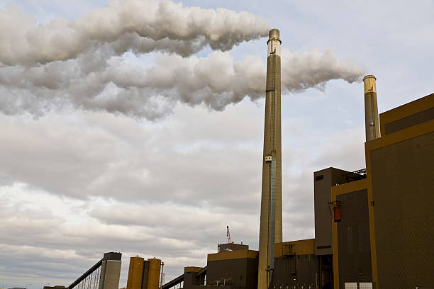 power plant exhaust stacks stock photo