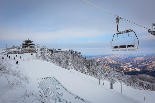 Cable car atop the snow-capped Deogyusan mountains at deogyusan national park near Muju, South Korea.