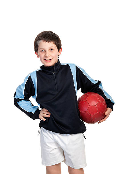 istock boy with soccer ball on white background 177267911