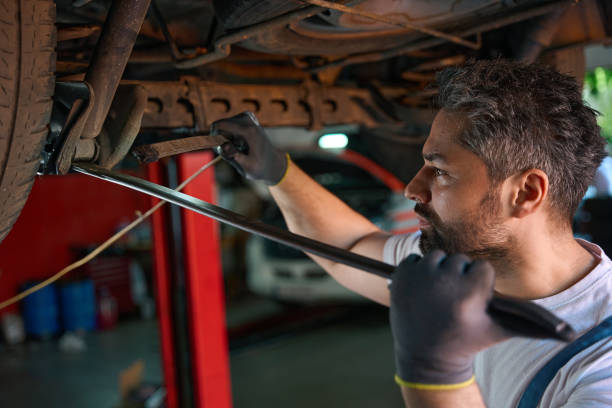 istock Experienced automotive service technician performing vehicle checkup 1772688700