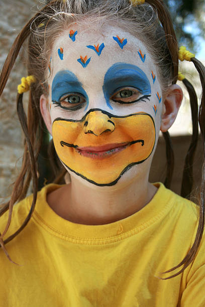 istock girl dressed up as easter chicken for Halloween 177269665