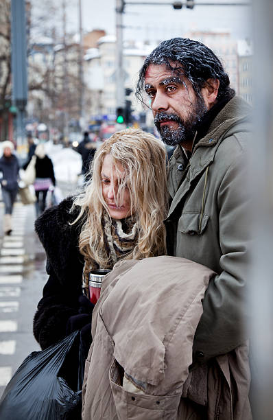 istock Homeless couple struggle city centre 177270007