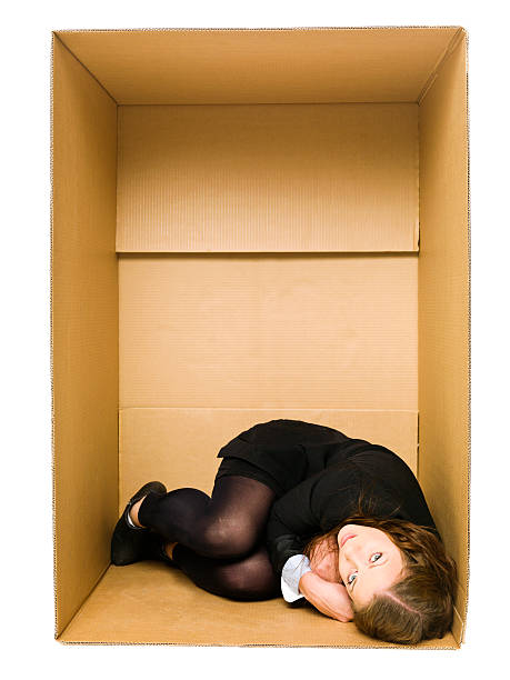 istock Woman in a Carboard Box 177270401