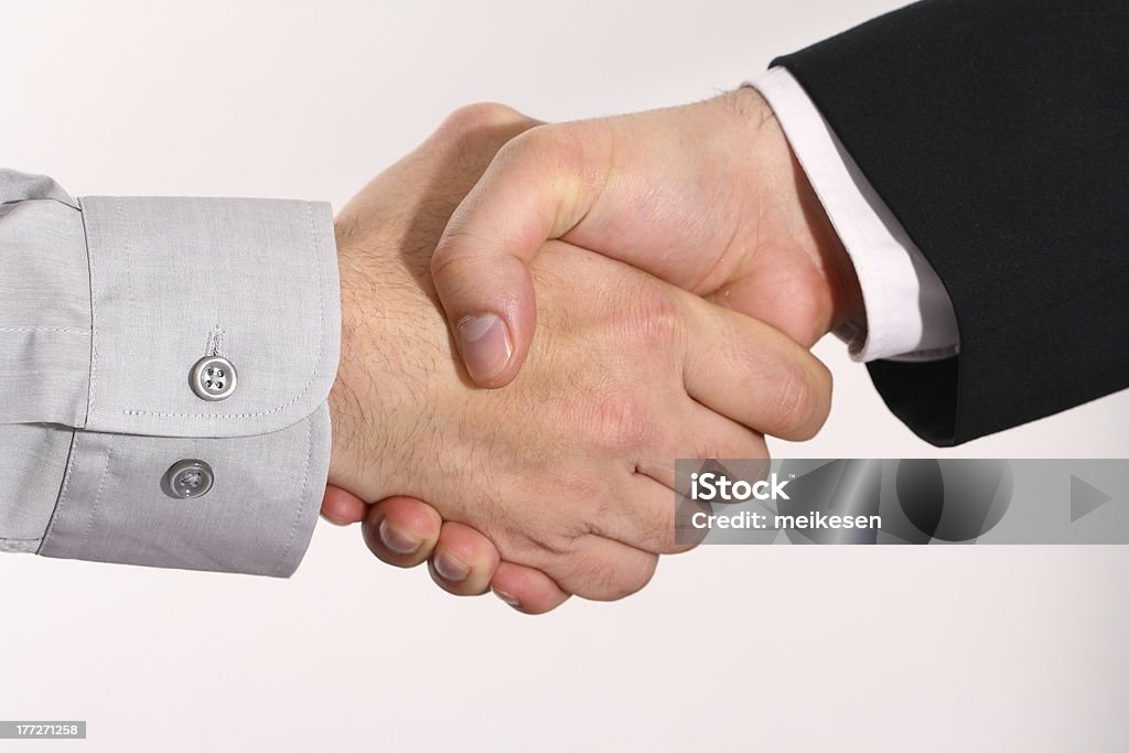 handshake handshake between two business people Adult Stock Photo