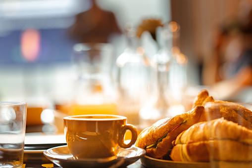 Hotel breakfast coffee. Food table.