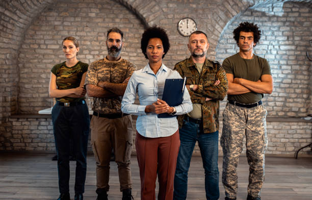 istock Portrait of diverse veterans at PTSD support group. 1772719197