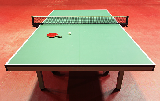 Fanático Permeabilidad animal A Ping Pong Table On A Red Floor Stock Photo - Download Image Now - Table  Tennis Table, Table Tennis, Activity - iStock