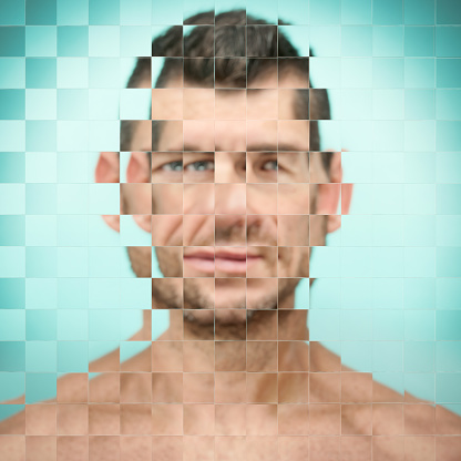 Broken image, diffracted through pixelated glass, of a  man, looking at the camera, that becomes an avatar. Collage CGI / photo