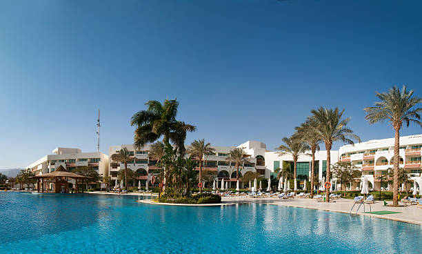 istock Winter holiday in Egypt - People relax by the pool 177272385