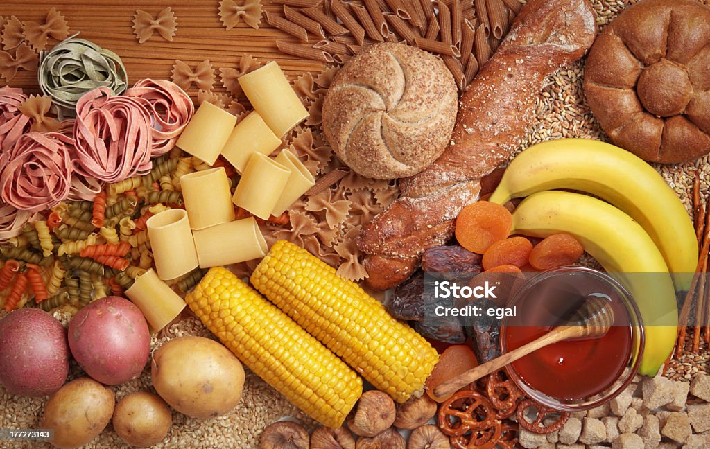 Overhead view of carbohydrate fruits and vegetables Foods high in carbohydrate Carbohydrate - Food Type Stock Photo